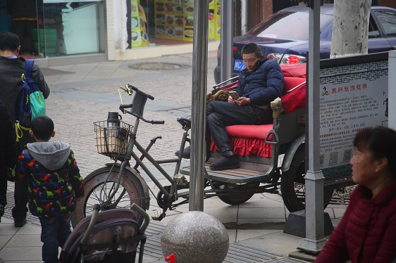 Fahrradtaxi in Südchina